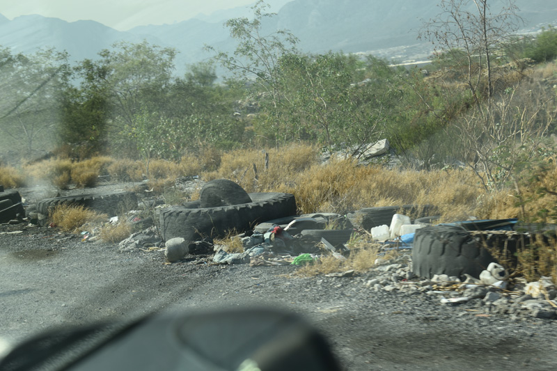 Lack of environmental legislation in Santa Catarina lets roadside littering of rubber, plastic and other garbage materials go unchecked